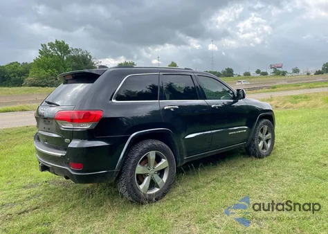 2014 Jeep Grand Cherokee Overland из США, поврежденный, VIN 1C4RJFCMXEC321975